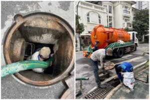 Nhân viên kiểm tra bể phốt để xác định thời gian hút hợp lý